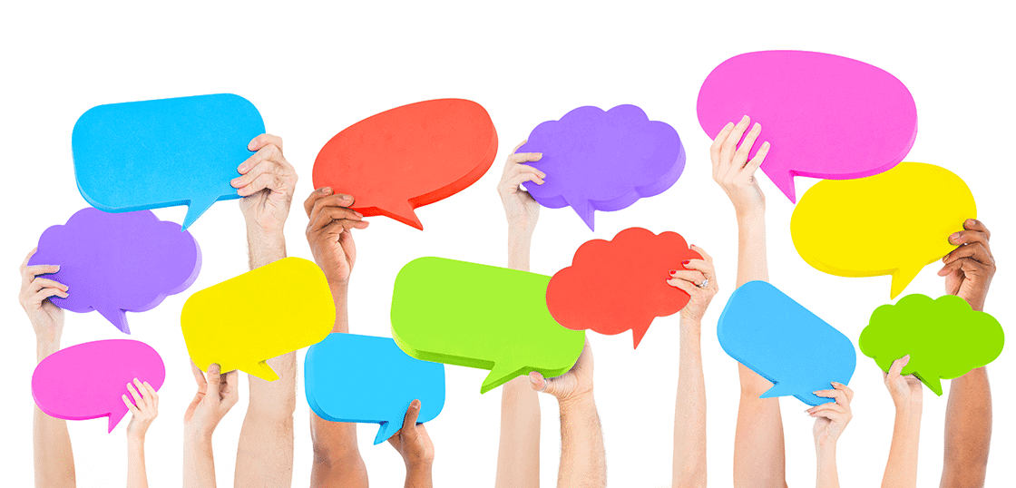 Hands holding colorful speech bubbles.